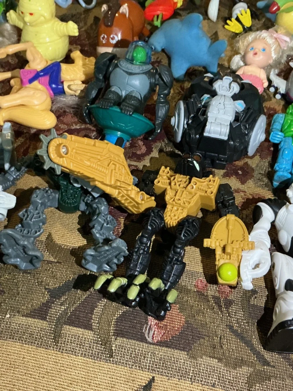 32 Miscellaneous small Toy lot with NBA Bionicle looney tune barbie and more